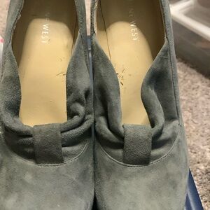 Nine West grey suede heals.  Never worn outside. Little peeling inside shoes.
